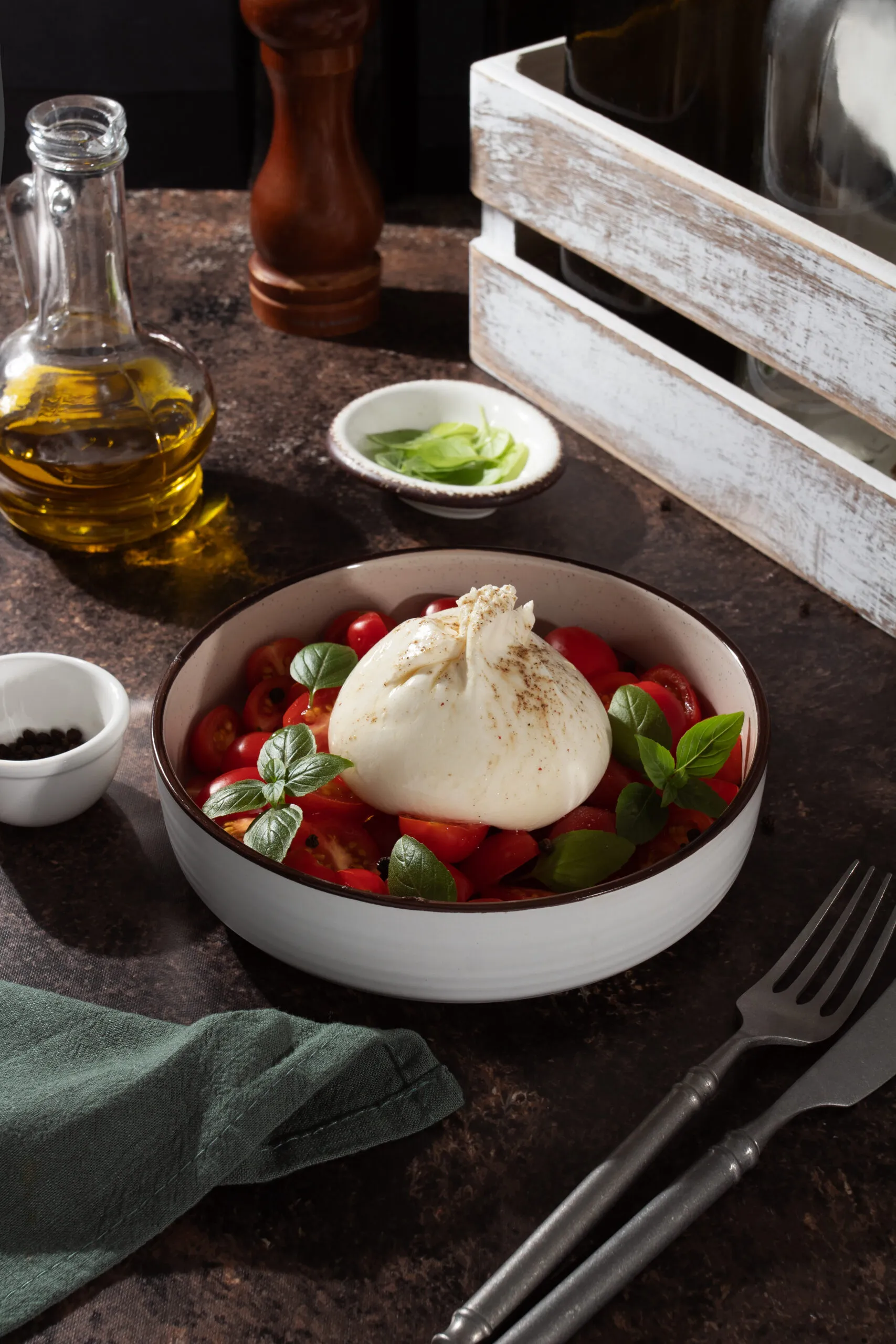 Lactose-free burrata with fresh cherry tomatoes and basil